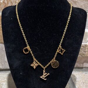 Gorgeous Gold LV Charm necklace.